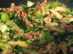 Step 3: Add pork to vegetables