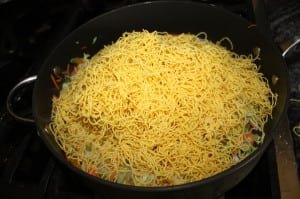 Add the noodles and broth