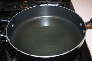 Place oil in pan and heat to 370 degrees